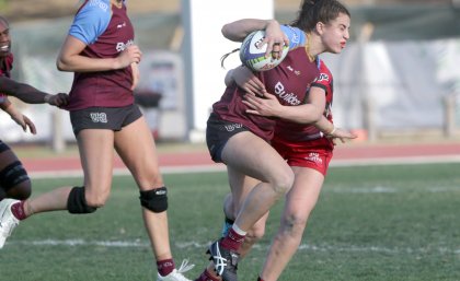 Image: Marioulla Belessis (Credit: Rugby Australia/Sportography) UQ-player-Marioulla-Belessis-is-tackled-as-she-runs-the-ball-forward